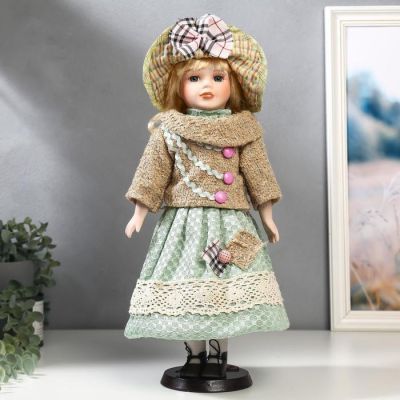 Кукла коллекционная керамика "Блондинка с кудрями, в зелёном свитере с тесьмой" 40 см