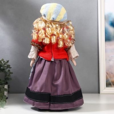 Кукла коллекционная керамика "Блондинка с кудрями, алый свитер с цветочками" 40 см