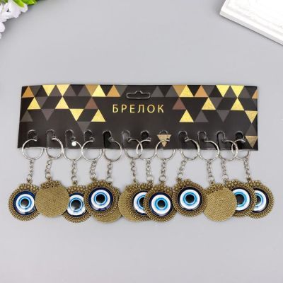 Брелок металл глазки "Круг с цветочками" под бронзу 4х3,6 см