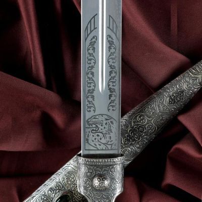 Кинжал сувенирный К-03в мельхиоре, ножны украшены кавказским орнаментом, чеканка, гравировка