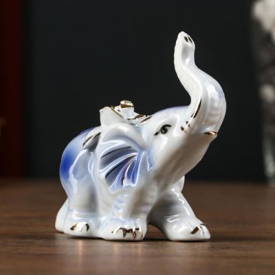 Сувенир керамика "Слонёнок с розой на спине" синий с золотом, страза 9х9х3,8 см