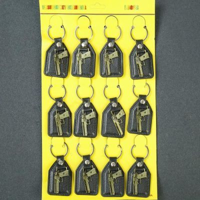 Брелок кожзам, металл "Пистолет" МИКС 6,8х3,8 см