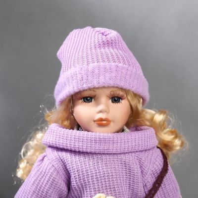 Кукла коллекционная керамика "Блондинка с кудрями, сиреневый свитер и шапочка" 40 см