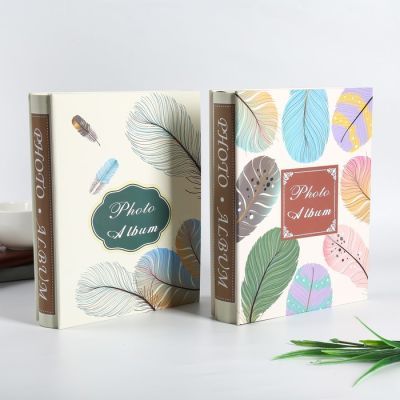 Фотоальбом на 200 фото 10х15 см "Пёрышки" серебр.обводка, в коробке МИКС 26х20,5х5,5 см