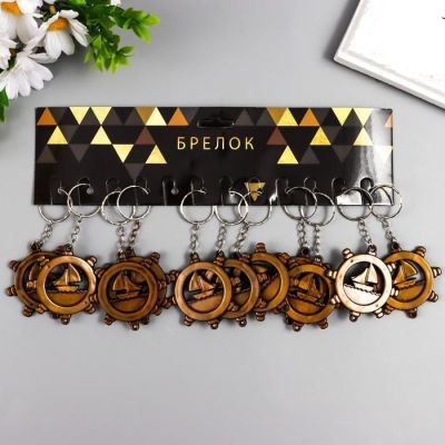 Брелок пластик под металл "Корабль в штурвале" 3,8х3,8 см