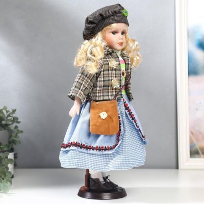 Кукла коллекционная керамика "Блондинка с кудрями, голубая юбка, пиджак в клетку" 40 см