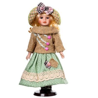 Кукла коллекционная керамика "Блондинка с кудрями, в зелёном свитере с тесьмой" 40 см
