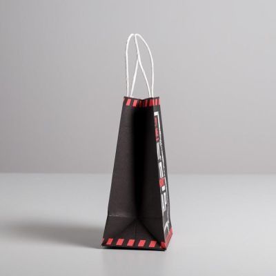 Пакет подарочный крафт «Тому кто держит удар», 12 × 21 × 9 см