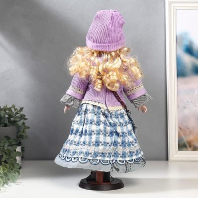 Кукла коллекционная керамика "Блондинка с кудрями, сиреневый свитер и шапочка" 40 см