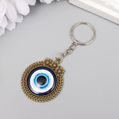 Брелок металл глазки "Круг с цветочками" под бронзу 4х3,6 см