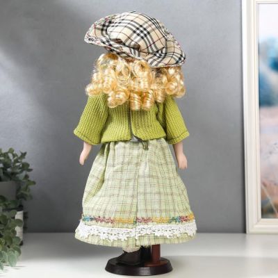 Кукла коллекционная керамика "Блондинка с кудрями, в зелёном свитере с тесьмой" 40 см