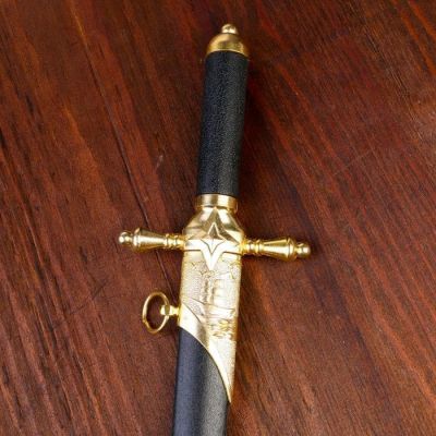 Сув. изд. кортик, ножны с оковками, рукоять чёрная, гарда капли 39 см