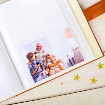 Фотоальбом кожзам на 200 фото с 2 местами под фото на обложке "Наша семья"